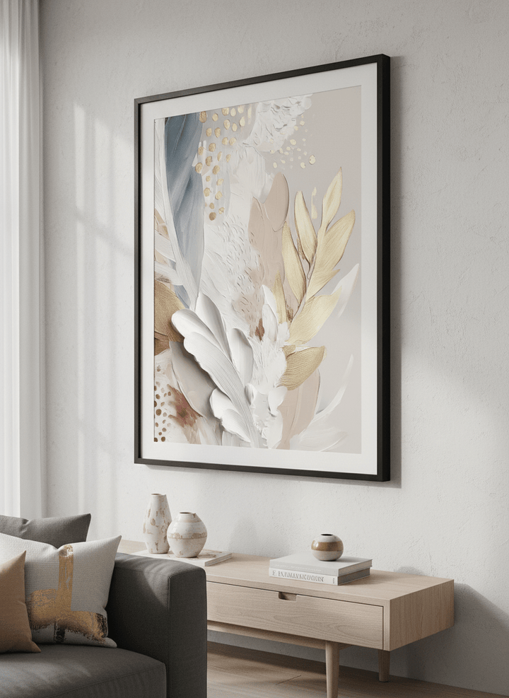 Modern wall art styled above a sofa in a neutral living room