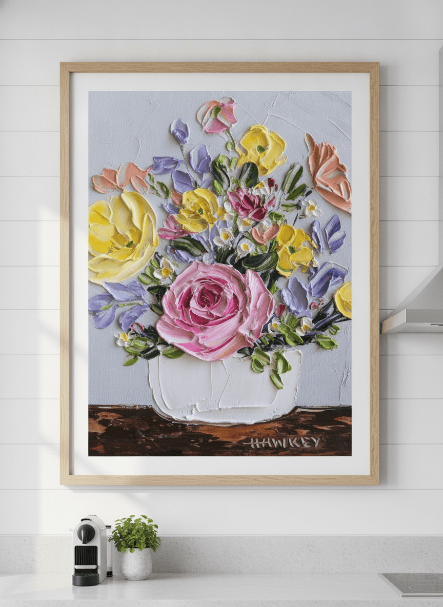 Artwork styled on the wall of a bright modern kitchen