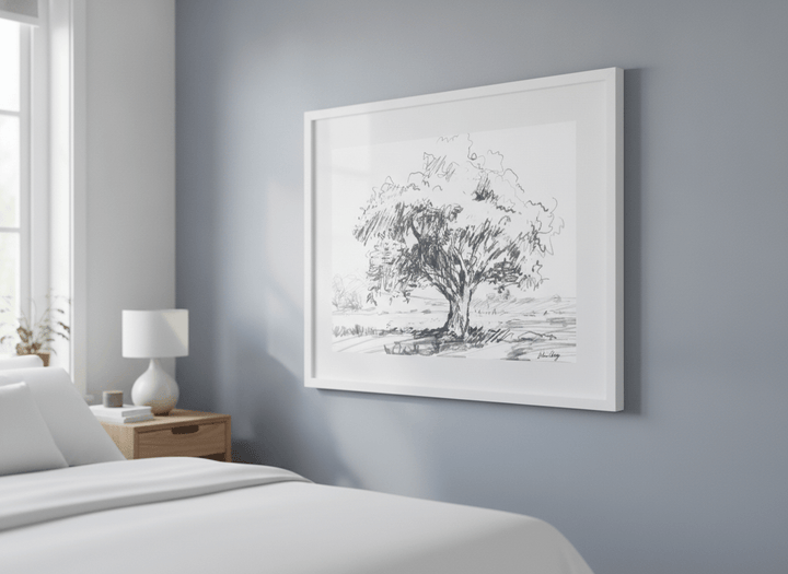Minimalist artwork displayed in a calm, light-filled bedroom interior
