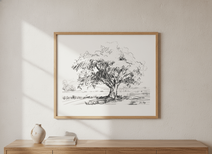 Wall art styled above a dining table in a contemporary home