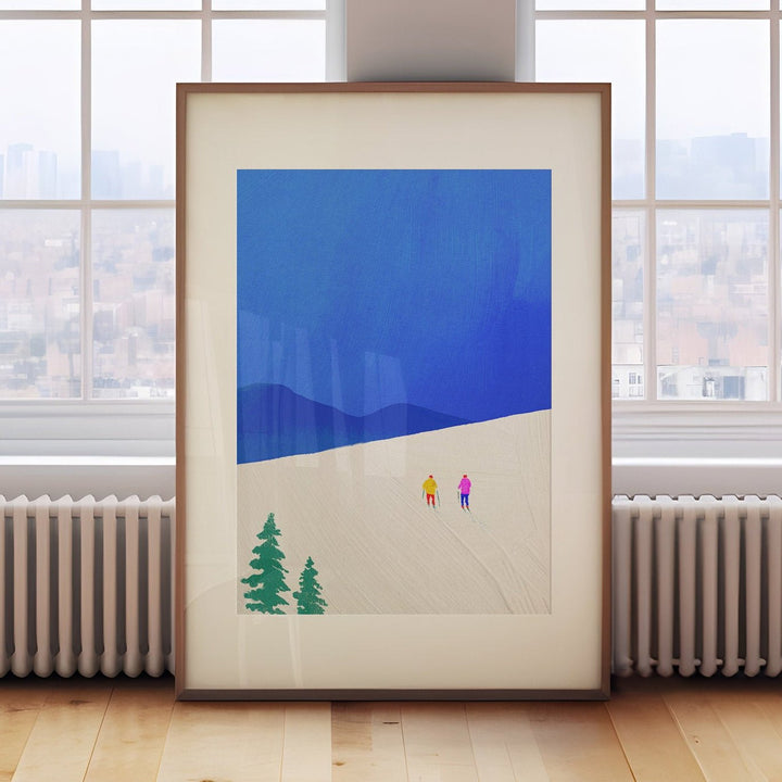 artwork with a blue sky and green trees on a wooden floor in front of large windows.