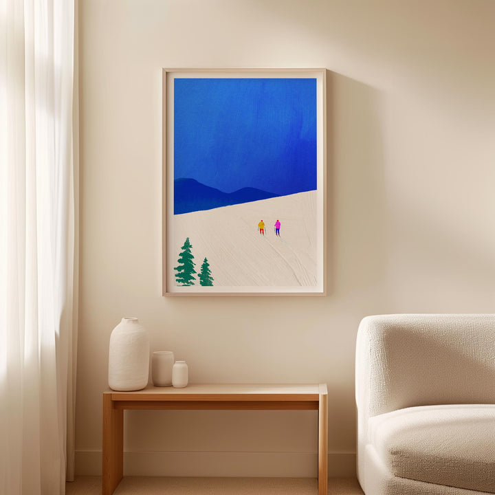 Artwork of two figures walking in a desert with mountains on a beige wall.