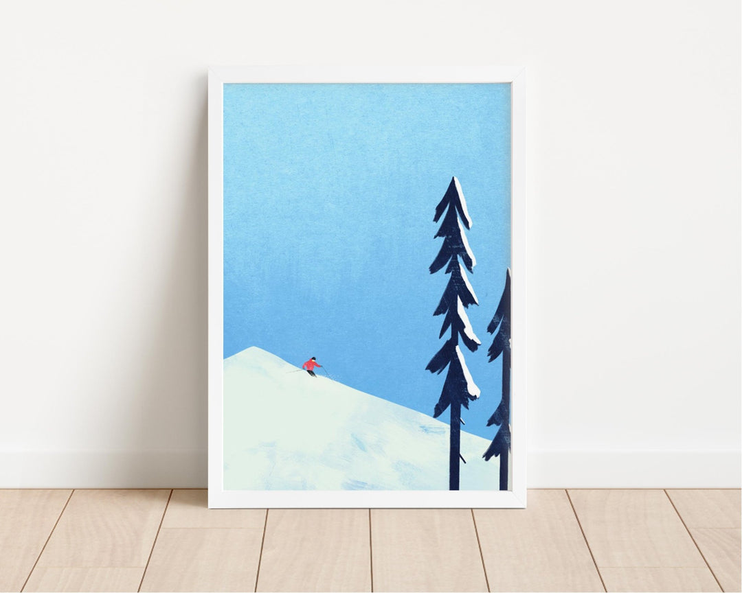 Poster of a snowy landscape with trees and a red figure on a white wall.