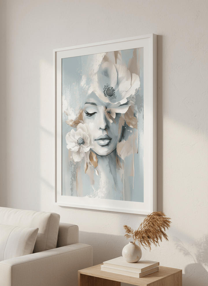 Modern wall art styled above a sofa in a neutral living room