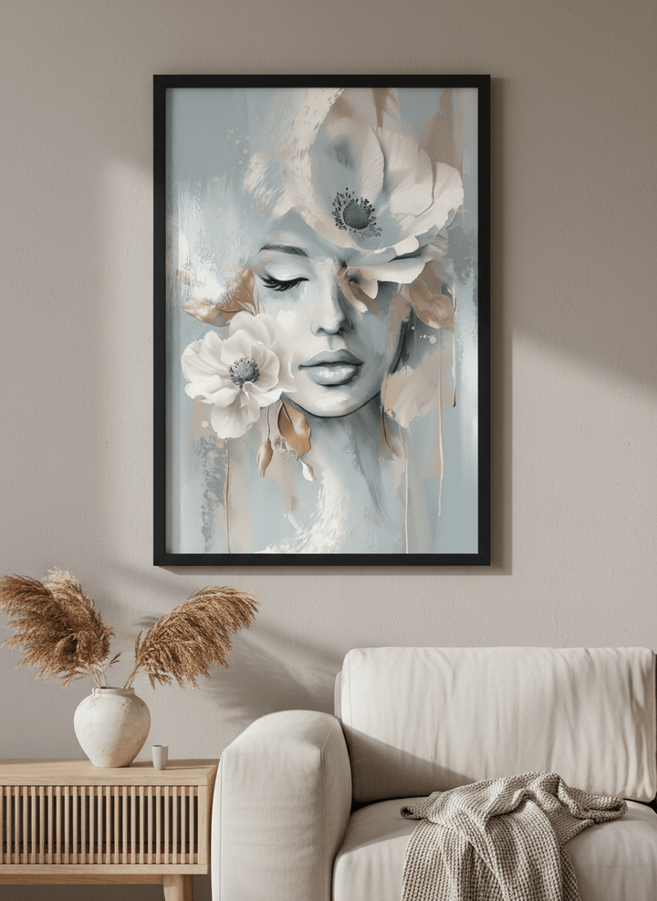Modern wall art styled above a sofa in a neutral living room