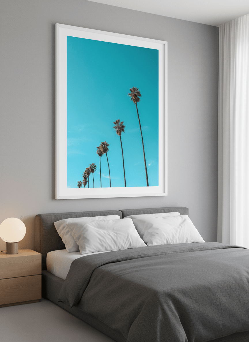 Minimalist artwork displayed in a calm, light-filled bedroom interior