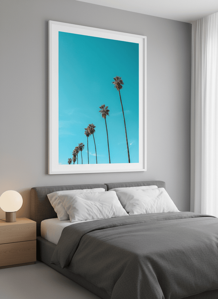 Minimalist artwork displayed in a calm, light-filled bedroom interior