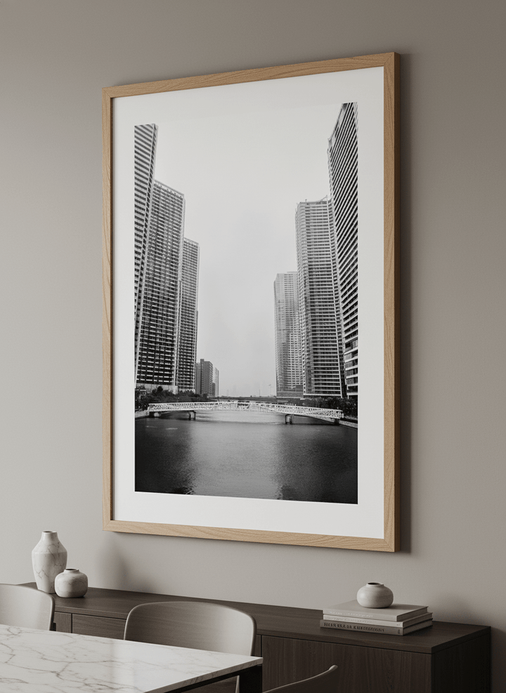 Wall art styled above a dining table in a contemporary home
