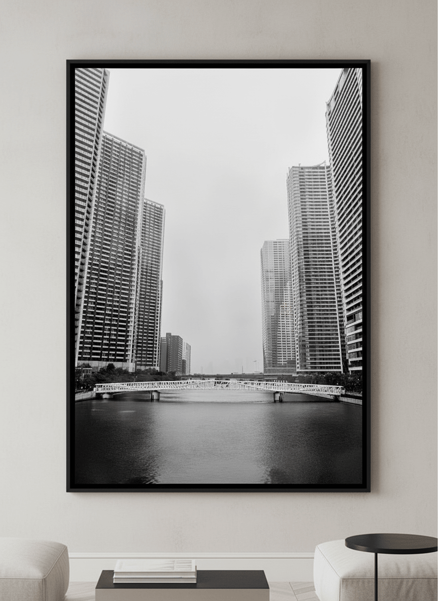 Modern wall art styled above a sofa in a neutral living room