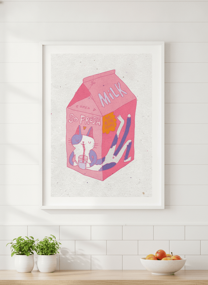 Artwork styled on the wall of a bright modern kitchen