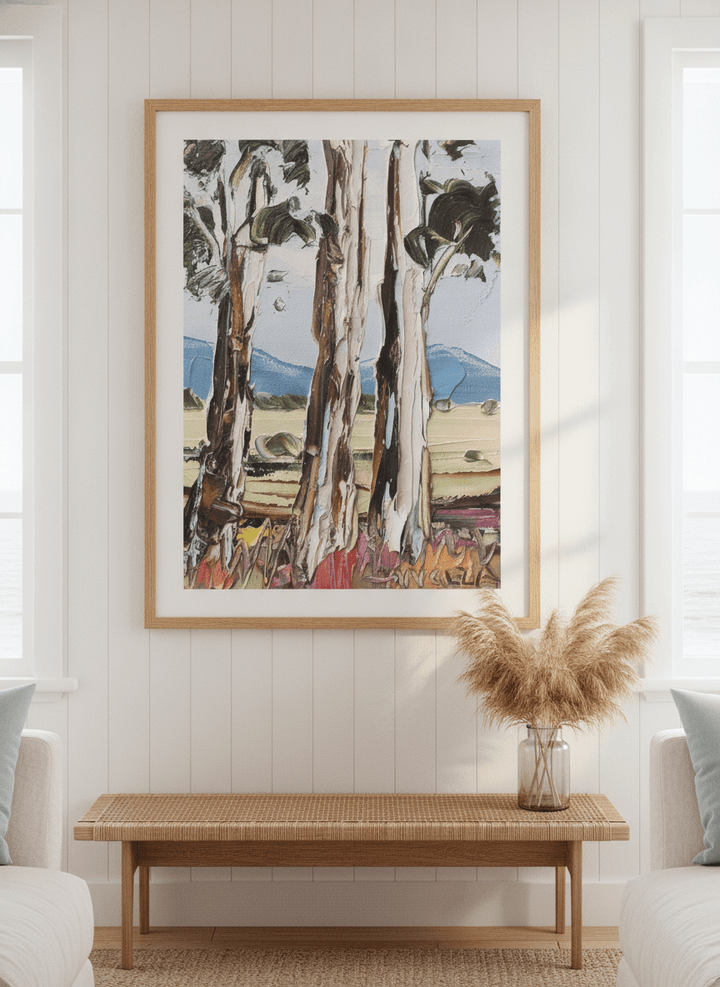 Neutral wall art displayed in a sunny coastal beach house