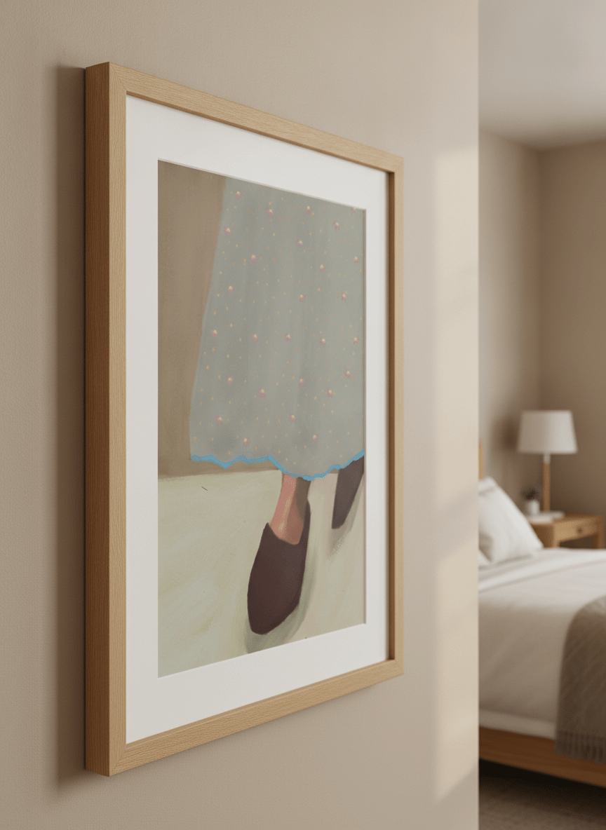 Minimalist artwork displayed in a calm, light-filled bedroom interior