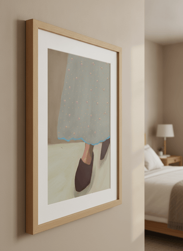 Minimalist artwork displayed in a calm, light-filled bedroom interior