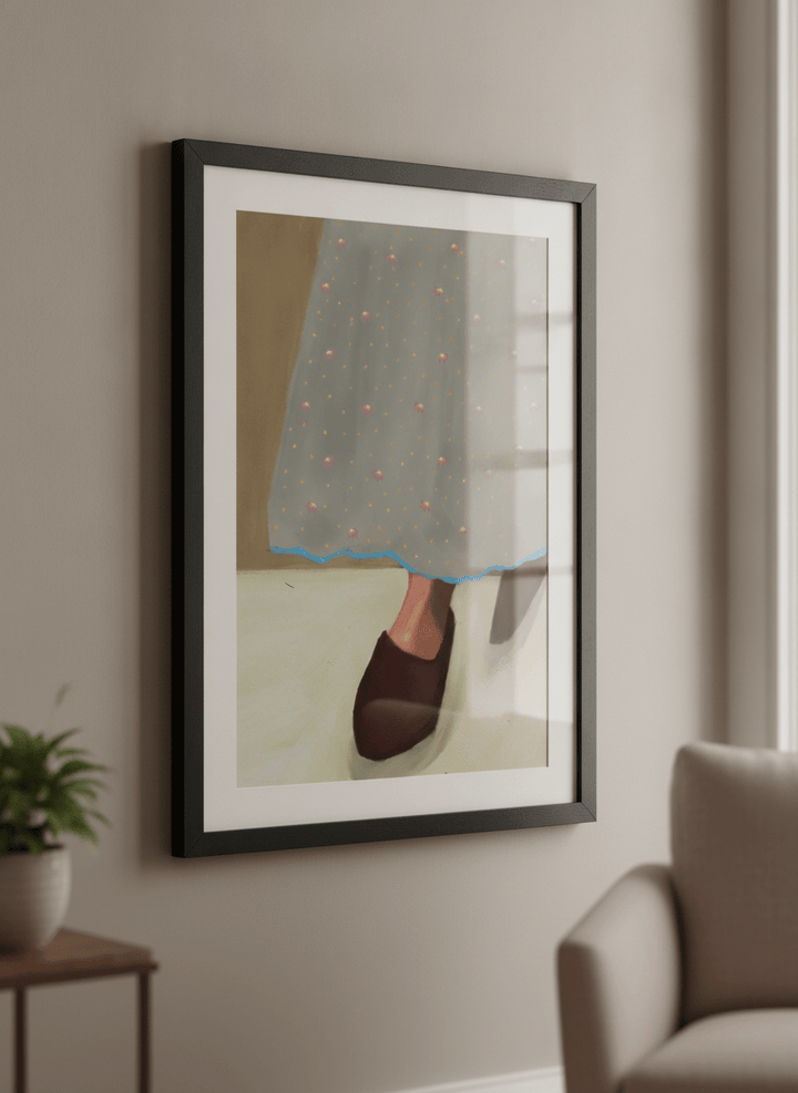 Modern wall art styled above a sofa in a neutral living room