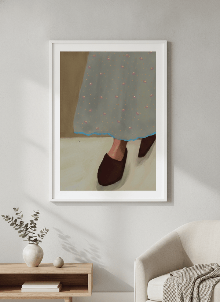 Modern wall art styled above a sofa in a neutral living room