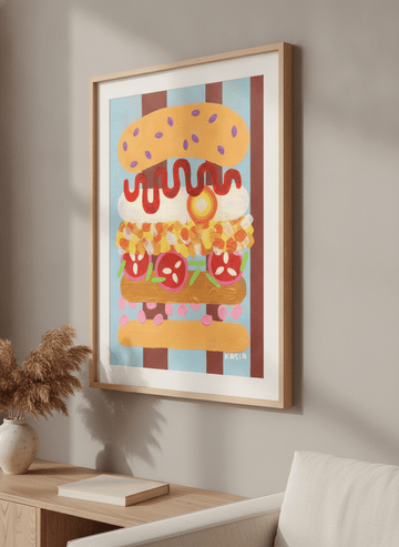 Modern wall art styled above a sofa in a neutral living room
