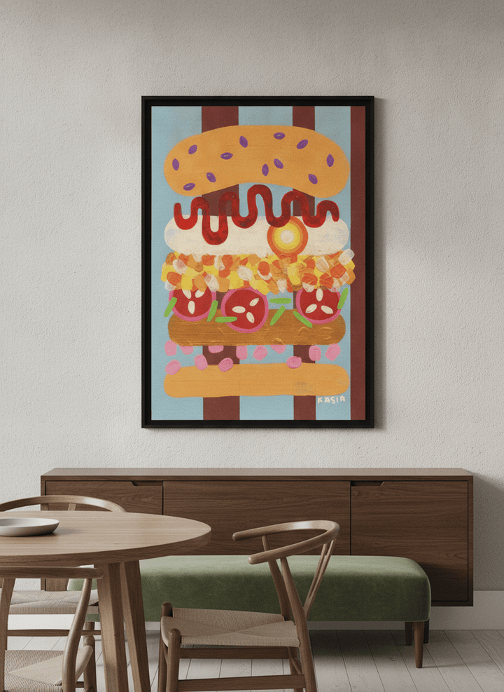 Wall art styled above a dining table in a contemporary home