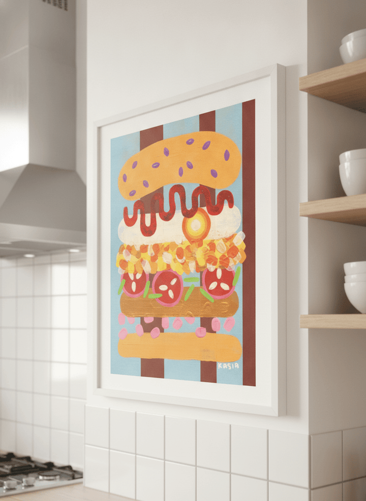 Artwork styled on the wall of a bright modern kitchen