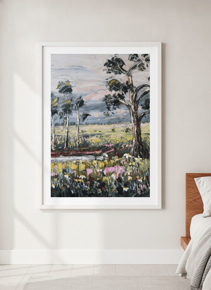 Minimalist artwork displayed in a calm, light-filled bedroom interior