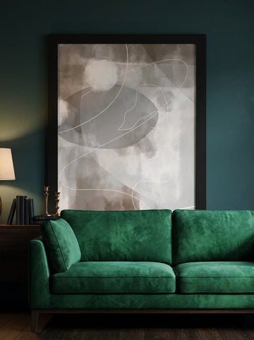 Modern wall art print styled on the wall in a moody living room