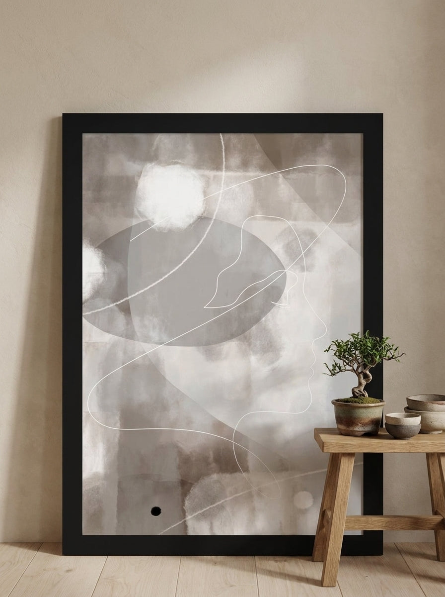 Oversized statement modern wall art print leaning against the wall in a warm Japandi bedroom