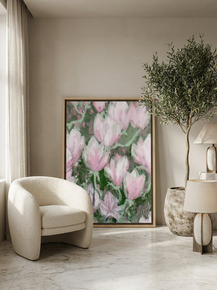 Canvas wall art with a natural timber surround leaning against the wall in a luxe bathroom