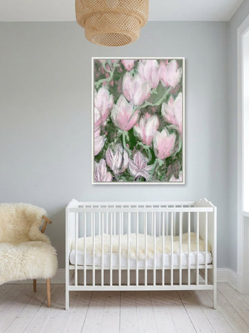 Canvas wall art with a white surround styled on the wall in a bright Scandinavian nursery