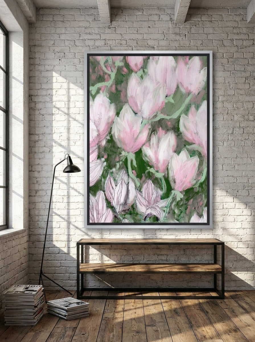 Oversized statement canvas wall art with a silver leaf surround styled on the wall in an industrial loft living room