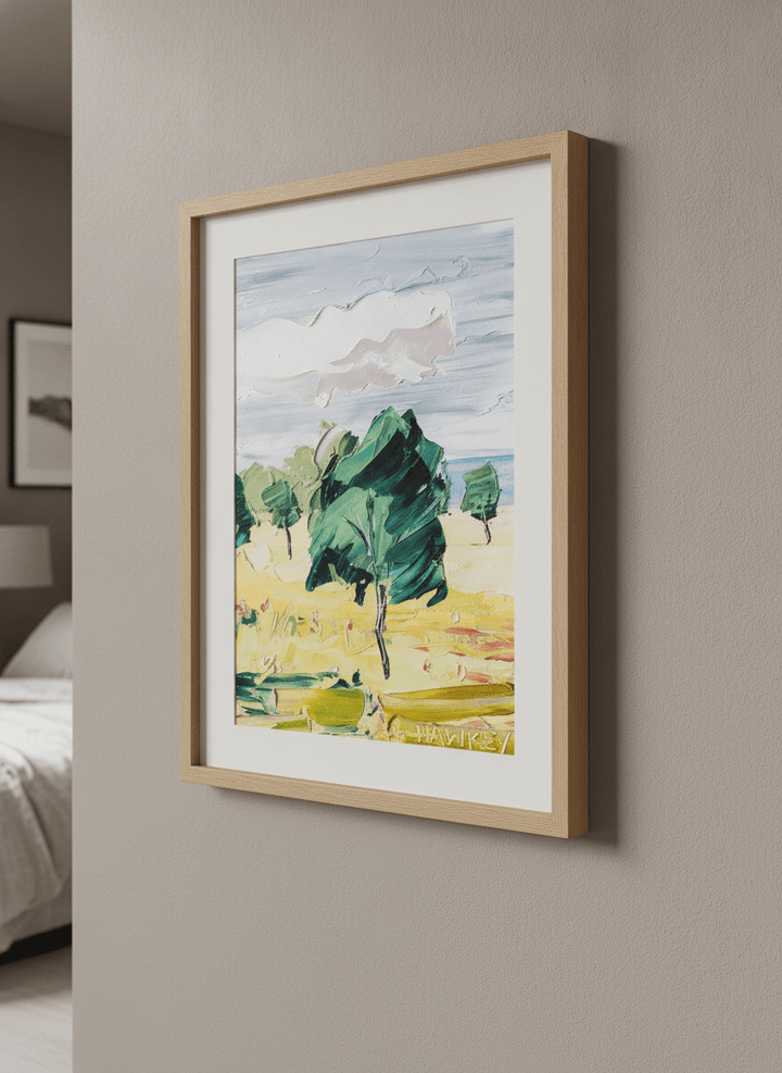 Minimalist artwork displayed in a calm, light-filled bedroom interior