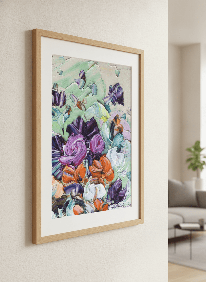 Modern wall art styled above a sofa in a neutral living room