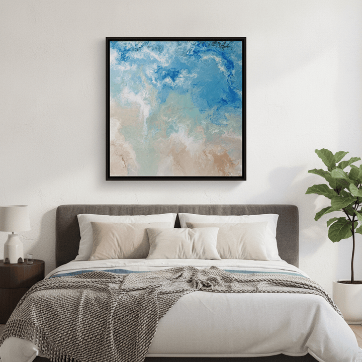 Canvas wall art with a black surround styled in a calm, light-filled bedroom
