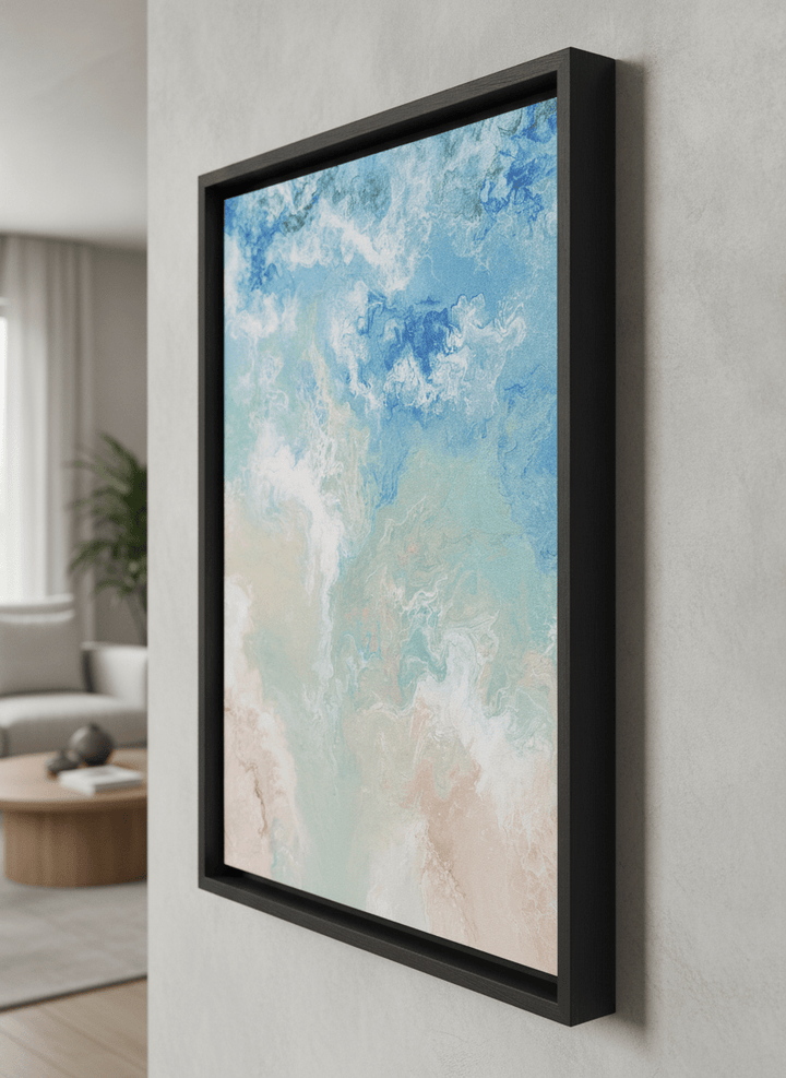 Modern wall art styled above a sofa in a neutral living room