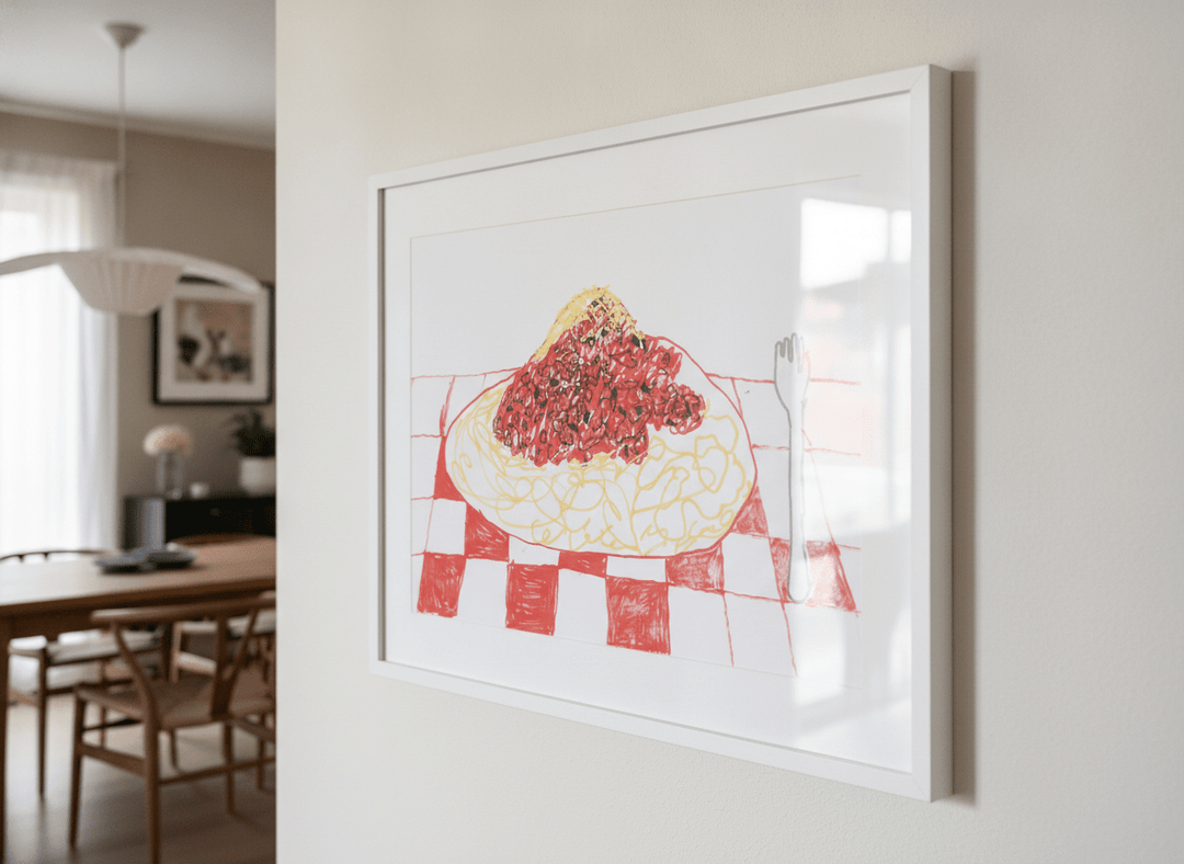 Wall art styled above a dining table in a contemporary home