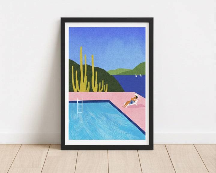 Artwork of a pool scene with a person lounging by the water on a white wall.