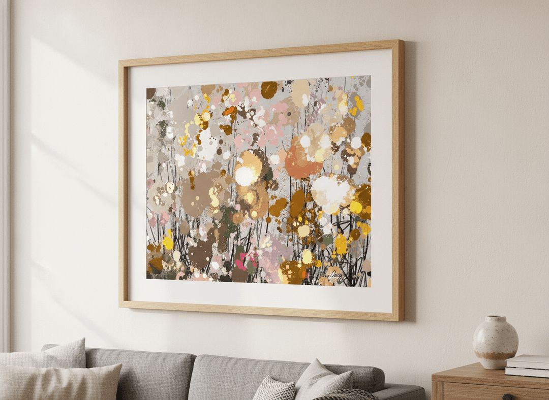 Modern wall art styled above a sofa in a neutral living room