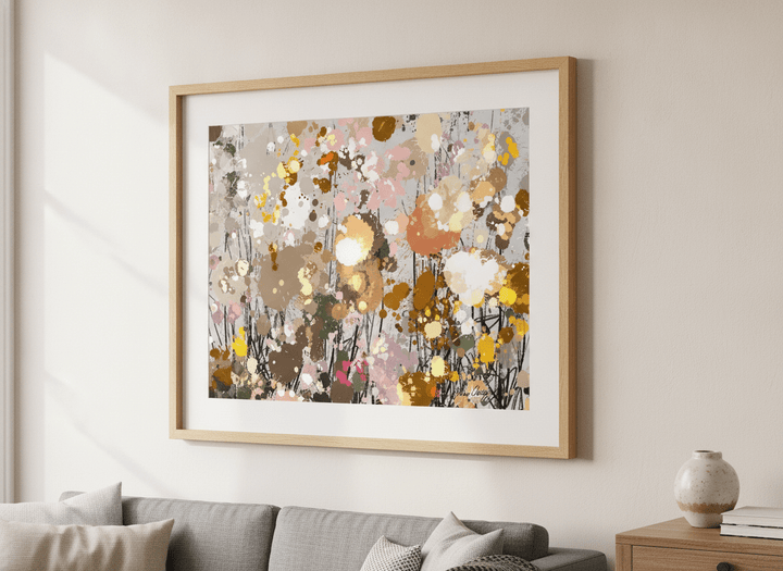 Modern wall art styled above a sofa in a neutral living room