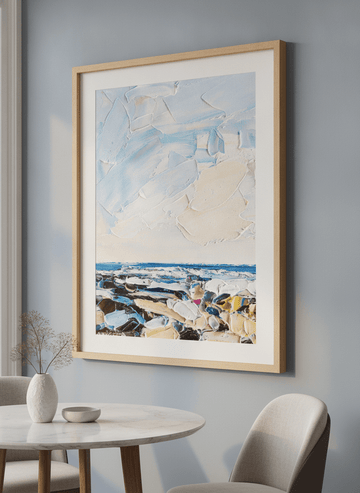Wall art styled above a dining table in a contemporary home