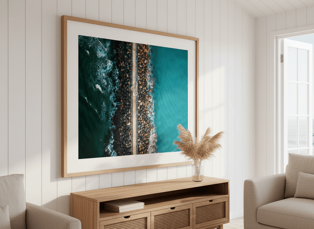 Neutral wall art displayed in a sunny coastal beach house