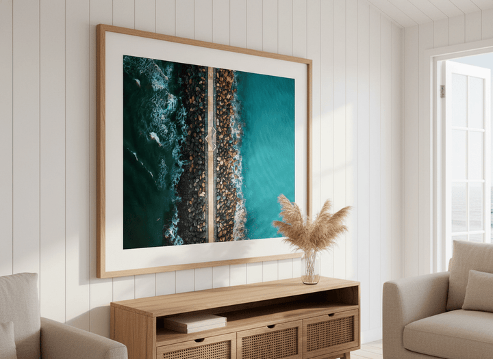 Neutral wall art displayed in a sunny coastal beach house