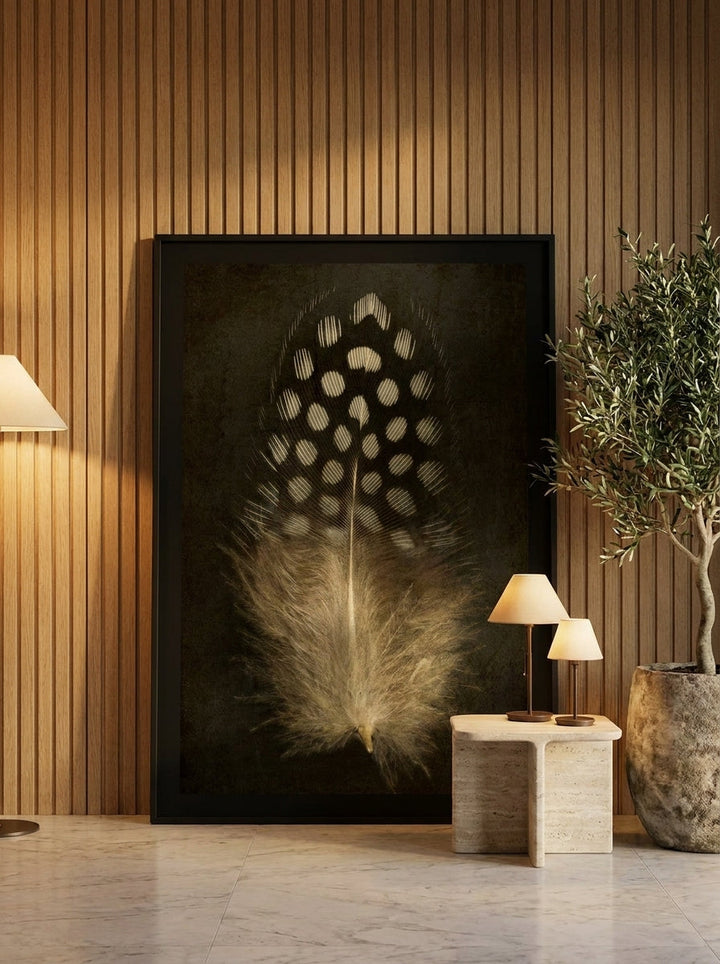 Oversized statement modern wall art print leaning against the wall in a luxe bedroom