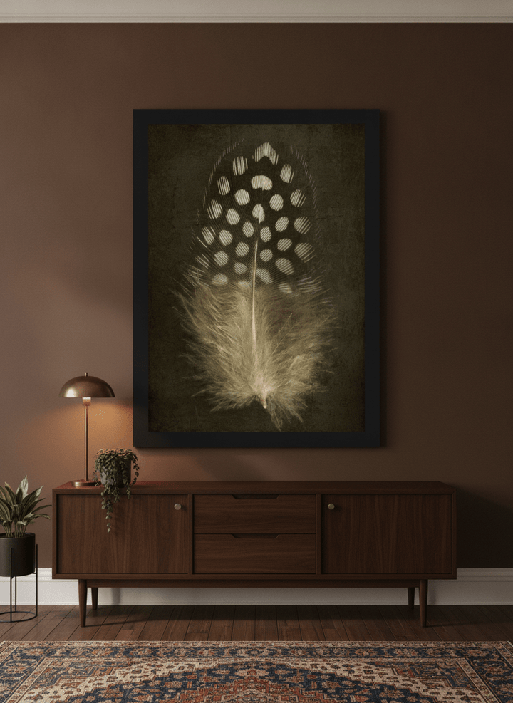Oversized statement modern wall art print styled on the wall in a moody living room