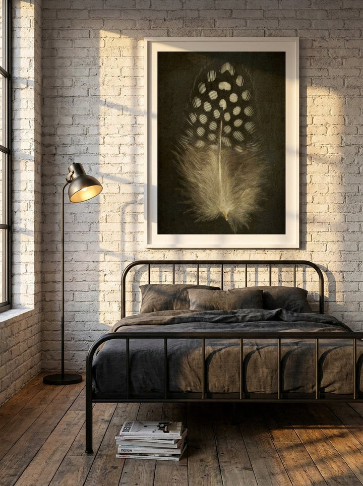 Modern wall art print styled on the wall in an industrial loft bedroom