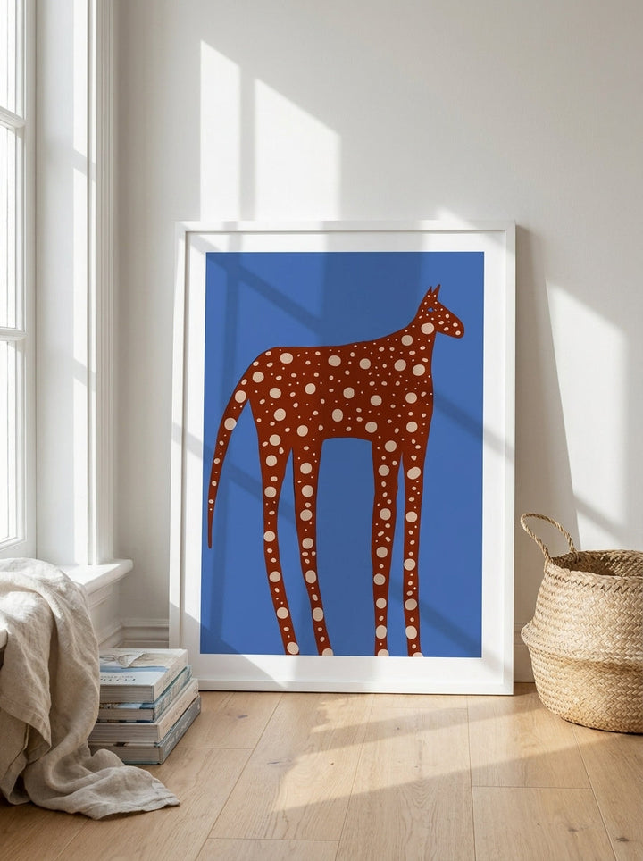 Modern wall art print leaning against the wall in a coastal kitchen