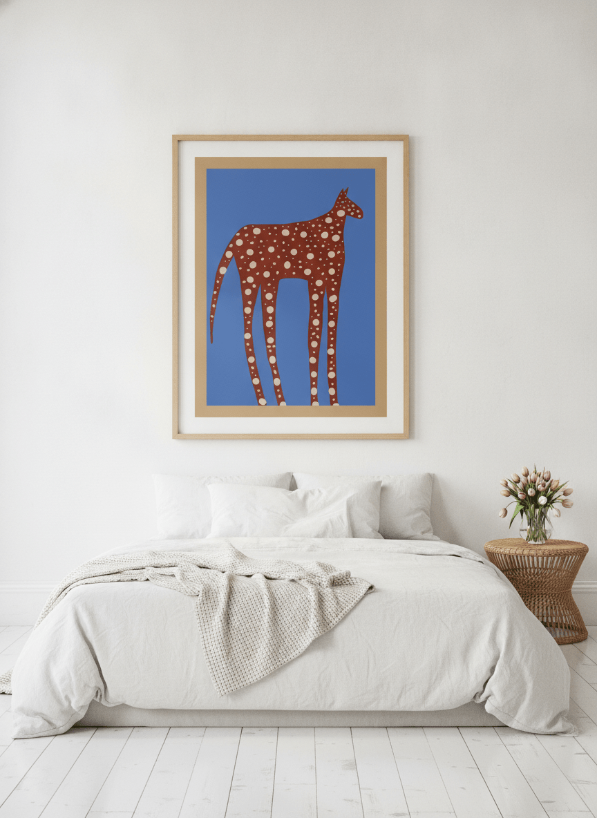 Oversized statement modern wall art print styled on the wall in a bright Scandinavian bedroom