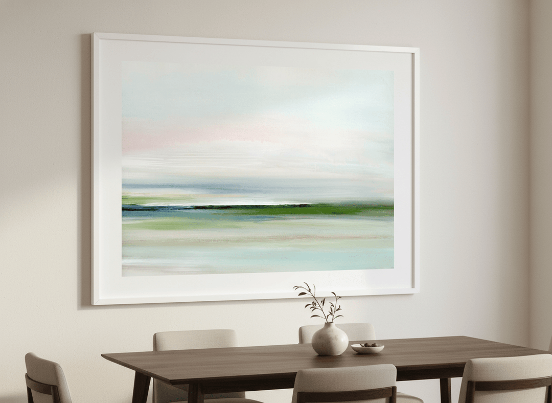 Wall art styled above a dining table in a contemporary home