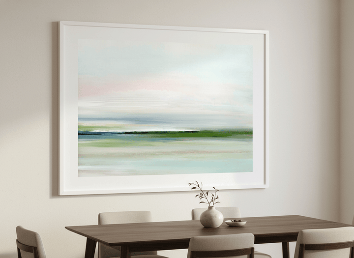 Wall art styled above a dining table in a contemporary home