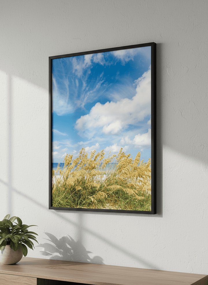 Modern wall art styled above a sofa in a neutral living room