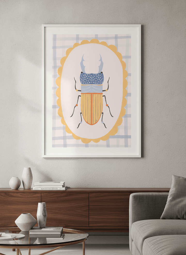 Modern wall art styled above a sofa in a neutral living room