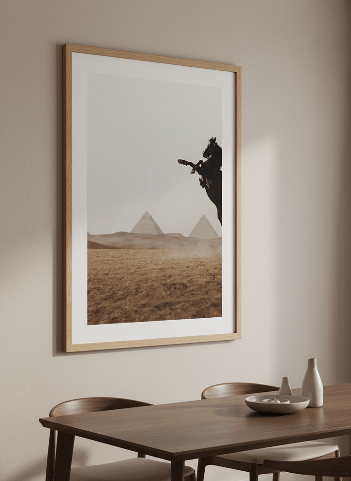 Wall art styled above a dining table in a contemporary home
