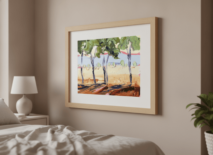 Minimalist artwork displayed in a calm, light-filled bedroom interior